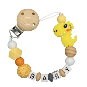 Attache tétine prénom dinosaure en silicone jaune